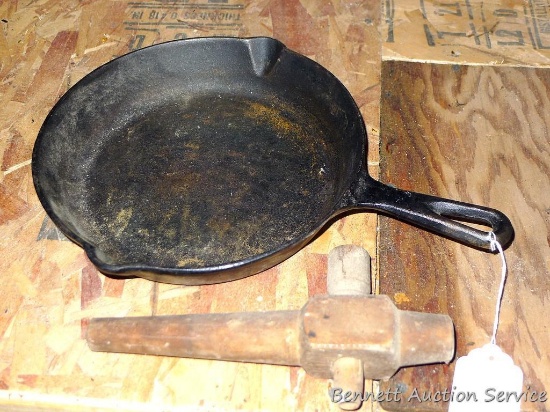 Cast iron frying pan 10" and 9" wooden barrel spicket.