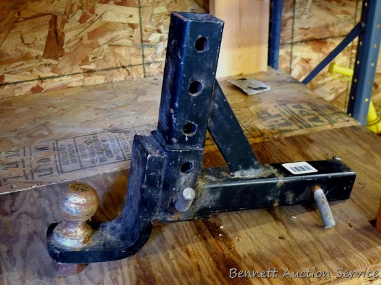 Adjustable 2" receiver hitch with a 2" ball. Approx. 18" long x 13" tall.