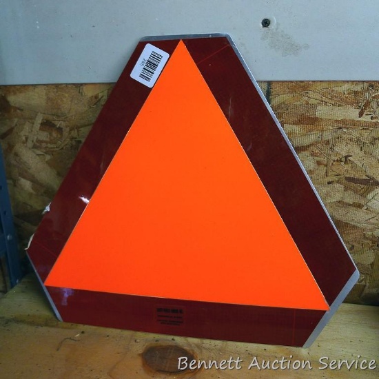 Reflective slow moving vehicle sign appears new 16" x 14".