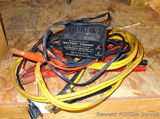 Super Smart battery tender, 12 volt at 1.25 amps. untested; set of jumper cables.