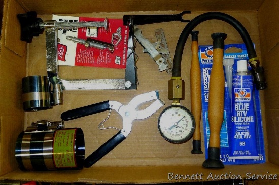 Ring compressors; compression tester; valve spring compressor; blue RTV silicone NIP and more.
