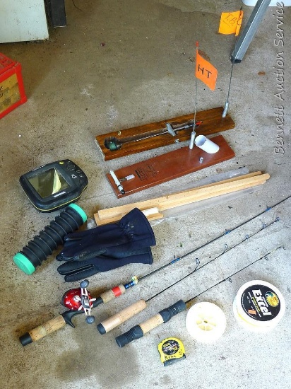 Humminbird fish finder 565; ice fishing poles; 2 tip-ups and more.