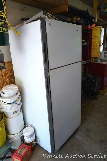 GE Refrigerator/Freezer 15.6 Cubic ft. no frost. 64" high x 28" wide x 28" deep. Reversable doors.