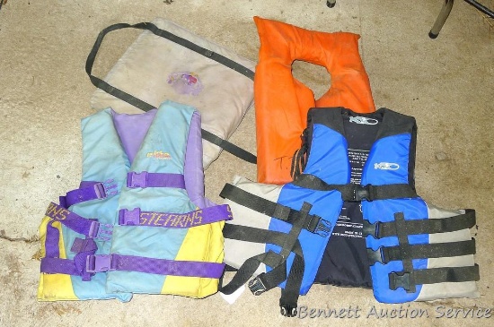 Three life jackets, Elite Stearns size adult Lg/XLg, shows fading; X2O size adult XXL/XXXL; Boat