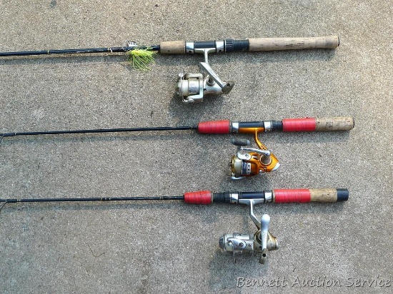 Three fishing rods with reels. One Shakespeare rod 60" tall with Shakespeare reel. One Pro Classic