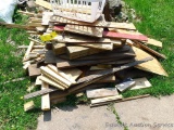Assortment of wood scraps includes chip board, pine and hardwood.