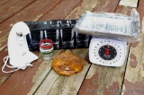 Kitchen items including a manual scale, electric can opener and set of 4 Medallion glasses.