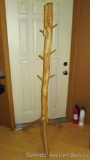 Rustic, wood coat tree. 70