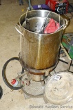 Propane turkey cooker includes hooks, gloves, safely glasses and more. Pot is 12
