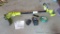 Ryobi 18 volt cordless weed trimmer comes with charger, manual and extra line. Works.