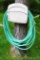 Suncast Hose Hangout wall mount hose keeper plus a length of garden hose. Please bring tools to
