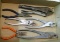 Hand pliers; vise grips; needle nose pliers. Longest is 10