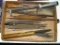 Round chain saw files; file cleaners; brass tube filled with small files.
