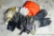 Assortment of used gloves includes leather and more.