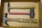 Claw hammer; rubber mallet; upholstery hammer. All appear in good shape.