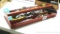 Metal tool box tray filled with tape measures; wrenches and more.