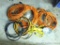 Four extension cords, various lengths. One has trouble light.