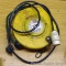 Electrical cord reel. Tape on the cord.