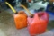 Blitz 5 gallon gas tote; 2-1/2 gallon gas tote with partial fluid in. No shipping.
