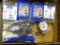Partial containers of screws, largest is 1-1/4