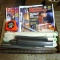 Popular Mechanics and Popular Science magazines; drawer guides; Lufkin 25' self centering tape