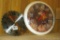 True Value saw blade clock, needs battery; White tail deer thermometer.