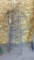 Nine 2' and 3' tall tomato cages; other plant stakes;