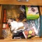 Junk drawer items including vases, steel wool soap pads, markers, small level, liquid nails;