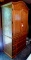 Wolfcraft armoire made of oak has 3 shelves and 3 drawers. All work good. 39