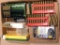 Assorted cartridges including .30-06, .35 Remington, .22LR, plus a MasterLock brand trigger lock.