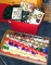 Tote of Christmas ornaments, some NIP; plus assorted wrapping paper.