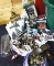 Assorted Christmas village pieces and accessories.