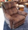 Lane swiveling rocker recliner is in good condition and in neutral tones.