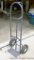 Pneumatic tire hand truck is over 4' tall.