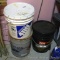 No shipping. Driveway sealer and hard set adhesive. Stored inside.