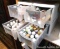 Four Sterilite organizer drawers full of craft paint. All stored inside.