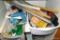 One Sterilite organizer drawer with a hot glue gun and glue sticks; plus a bin with wall paper