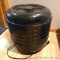 Food dehydrator with five trays.