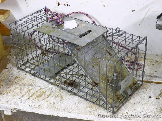 Metal live trap made by Havahart Lititz, PA 17" x 7" x 7".
