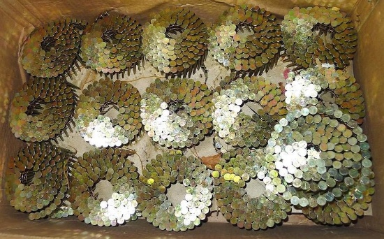 Partial box of coiled roofing nails 1-1/2" long.
