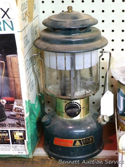 Coleman CLX 2 mantle lantern. If shipped will drain fluid.