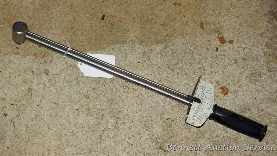 Sears 1/2" torque wrench 19-1/2" long, has some surface rust. Reads foot lbs.