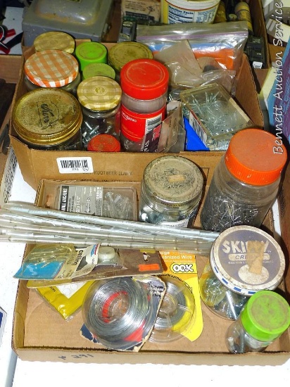 Two flats full of assorted screws, washers, anchors and more.