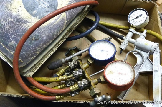 Uniweld air conditioning gauges; hand vacuum pump.