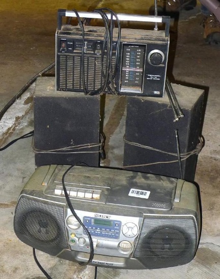 Sony & Realistic radios. One is a CD player also. Two speakers.