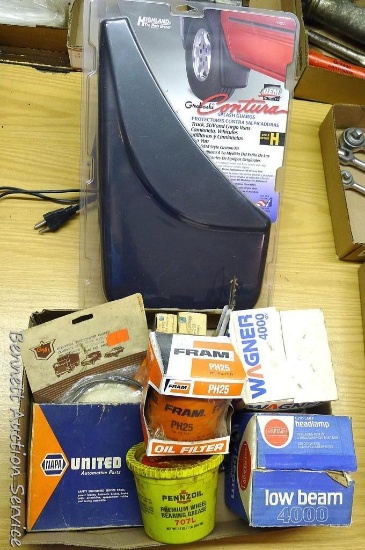 Set of automotive mud flaps NIP; oil filter; light bulb; wheel bearing grease.