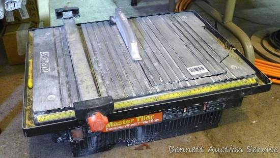 Plasplugs Master Tiler diamond wheel wet saw.