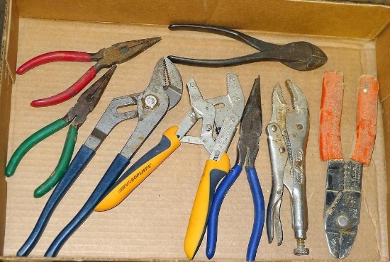 Assortment of pliers includes needle nose, side cutters, adjustable pliers and more.