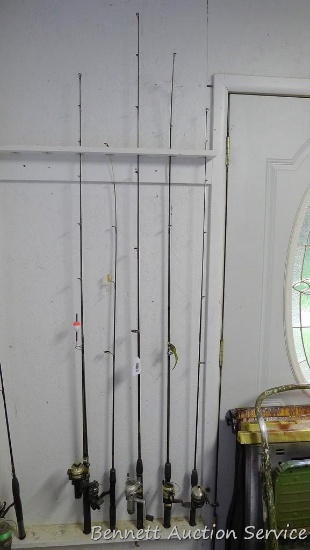 Five fishing rods with reels, tallest is 80" includes Cardinal with a graphite rod; St Croix; Zebco