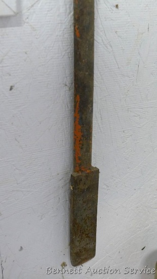 Homemade ice chisel with ring on end 54" long.